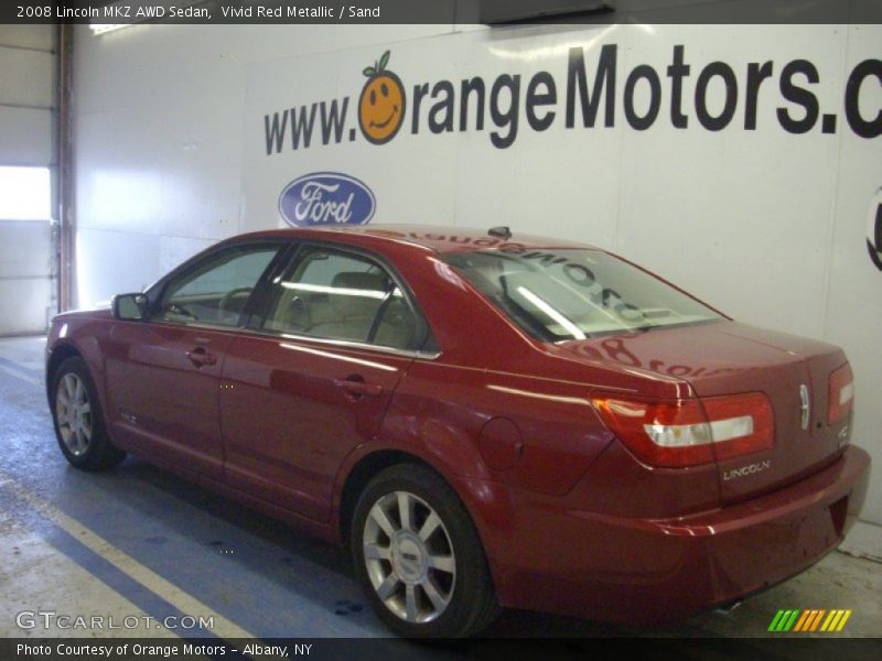 Vivid Red Metallic / Sand 2008 Lincoln MKZ AWD Sedan