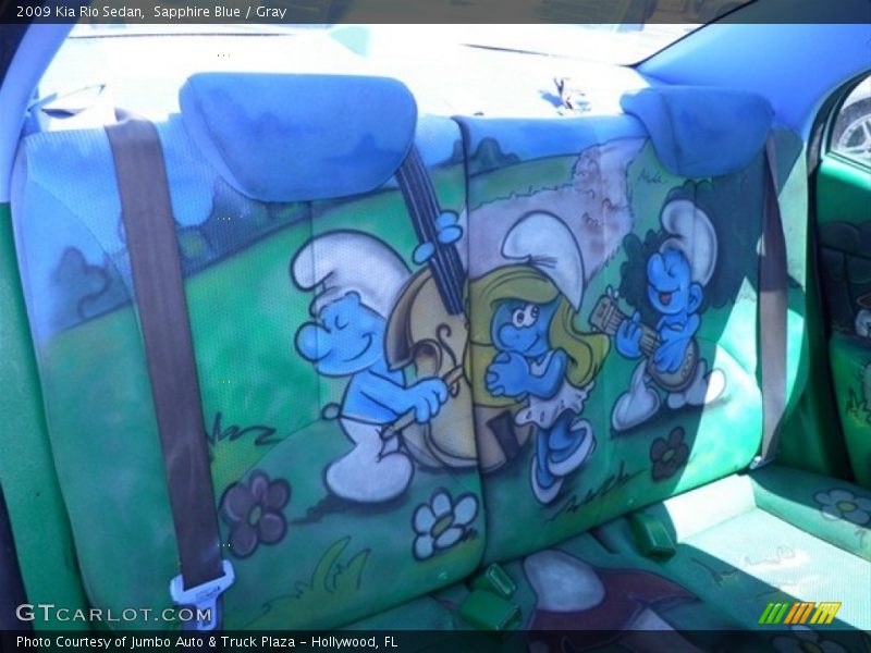 Smurfette on rear seats - 2009 Kia Rio Sedan