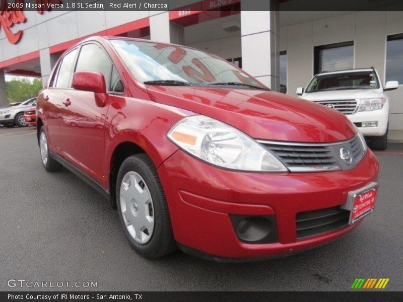 Red Alert / Charcoal 2009 Nissan Versa 1.8 SL Sedan