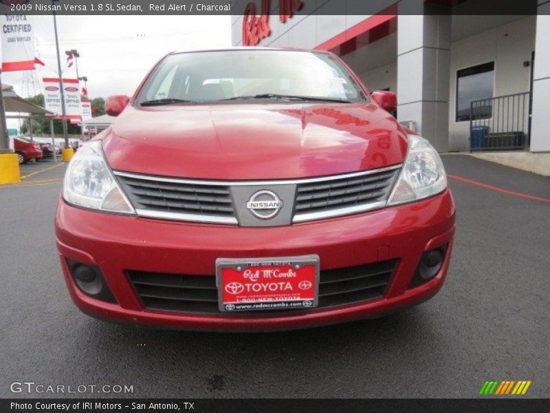 Red Alert / Charcoal 2009 Nissan Versa 1.8 SL Sedan