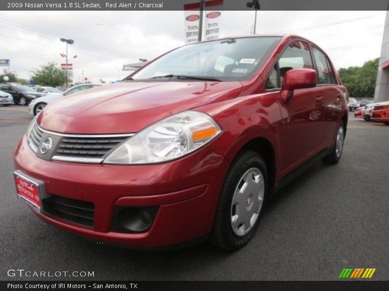 Red Alert / Charcoal 2009 Nissan Versa 1.8 SL Sedan