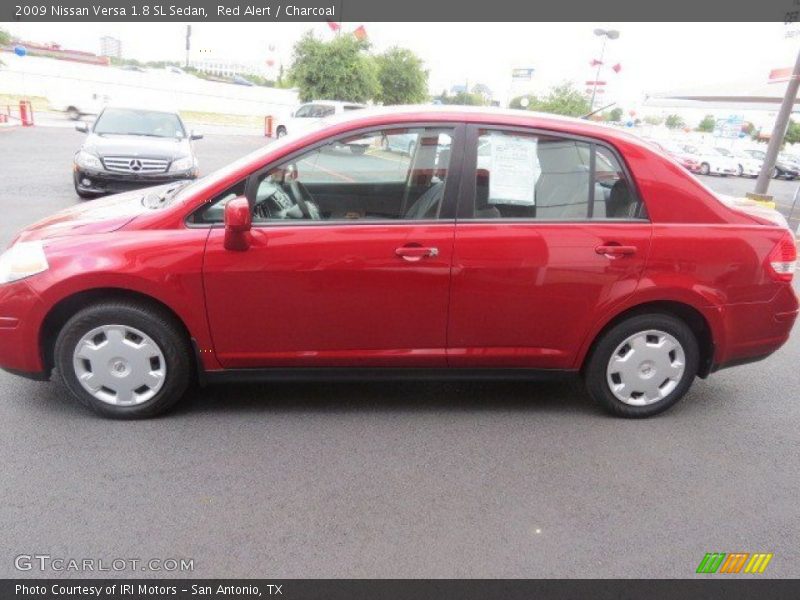 Red Alert / Charcoal 2009 Nissan Versa 1.8 SL Sedan