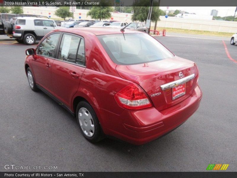 Red Alert / Charcoal 2009 Nissan Versa 1.8 SL Sedan
