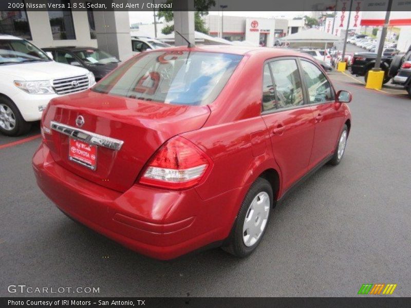 Red Alert / Charcoal 2009 Nissan Versa 1.8 SL Sedan