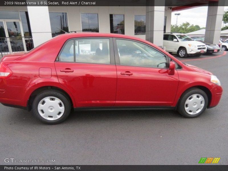 Red Alert / Charcoal 2009 Nissan Versa 1.8 SL Sedan