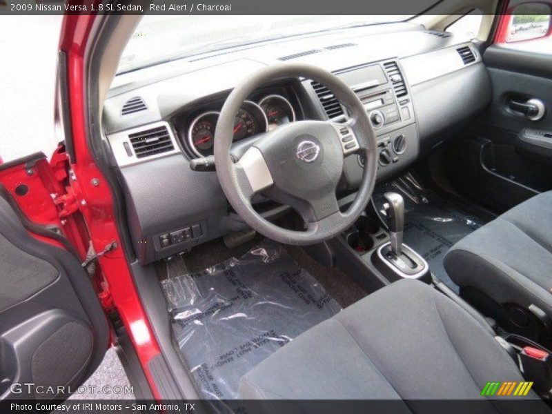 Red Alert / Charcoal 2009 Nissan Versa 1.8 SL Sedan
