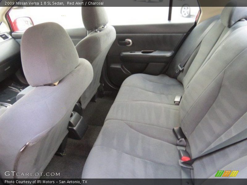 Red Alert / Charcoal 2009 Nissan Versa 1.8 SL Sedan