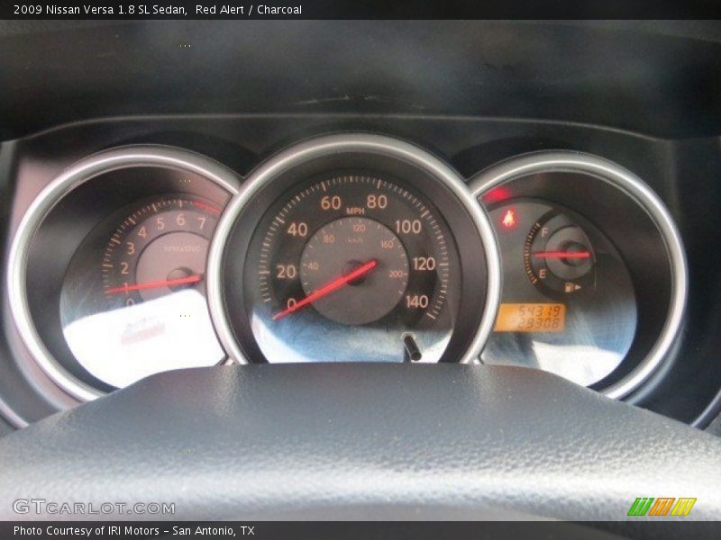 Red Alert / Charcoal 2009 Nissan Versa 1.8 SL Sedan