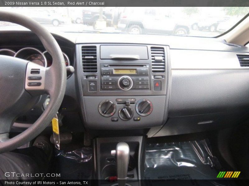 Red Alert / Charcoal 2009 Nissan Versa 1.8 SL Sedan