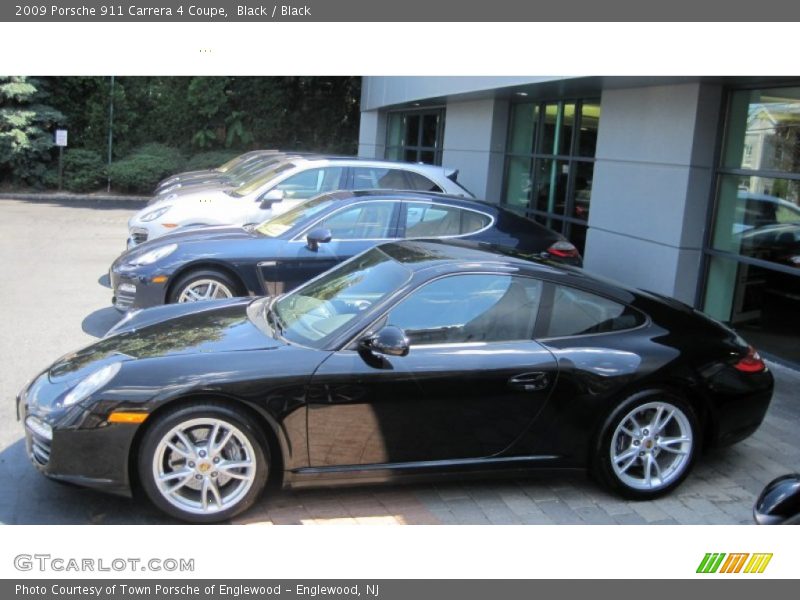 Black / Black 2009 Porsche 911 Carrera 4 Coupe