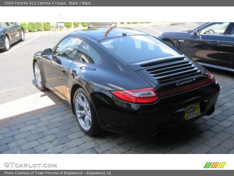 Black / Black 2009 Porsche 911 Carrera 4 Coupe