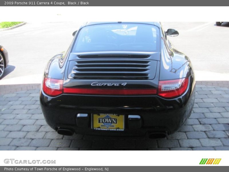 Black / Black 2009 Porsche 911 Carrera 4 Coupe