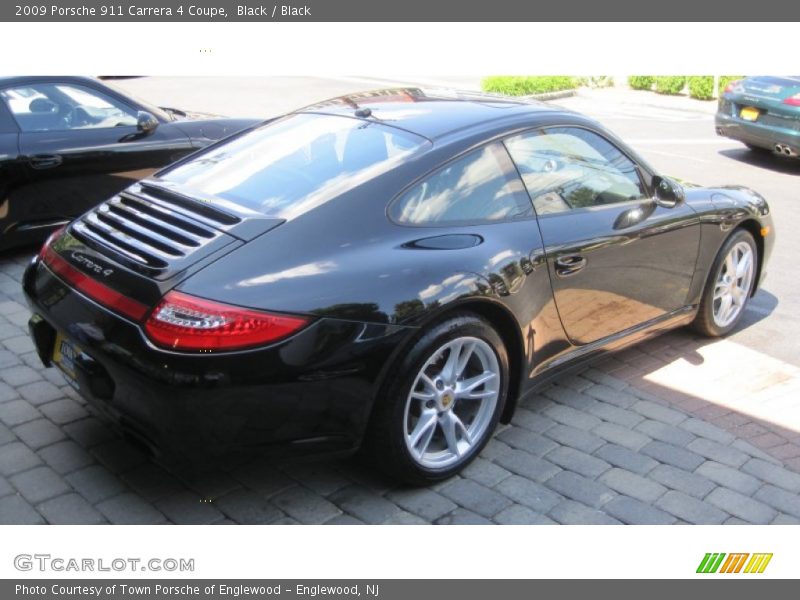 Black / Black 2009 Porsche 911 Carrera 4 Coupe
