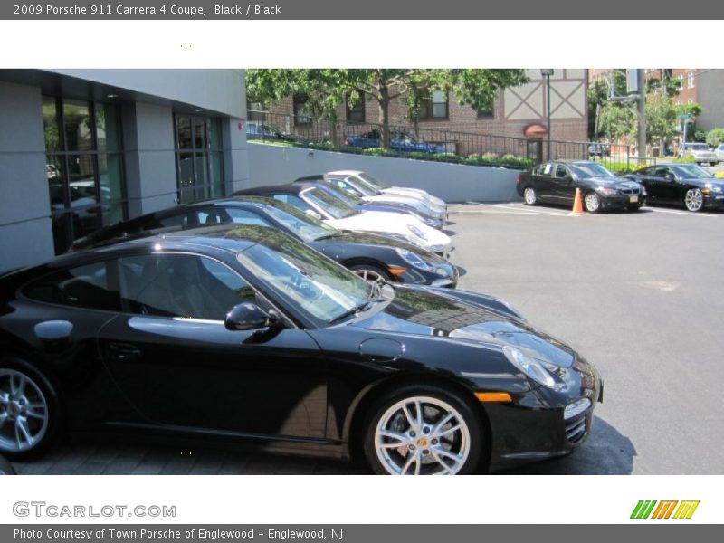 Black / Black 2009 Porsche 911 Carrera 4 Coupe