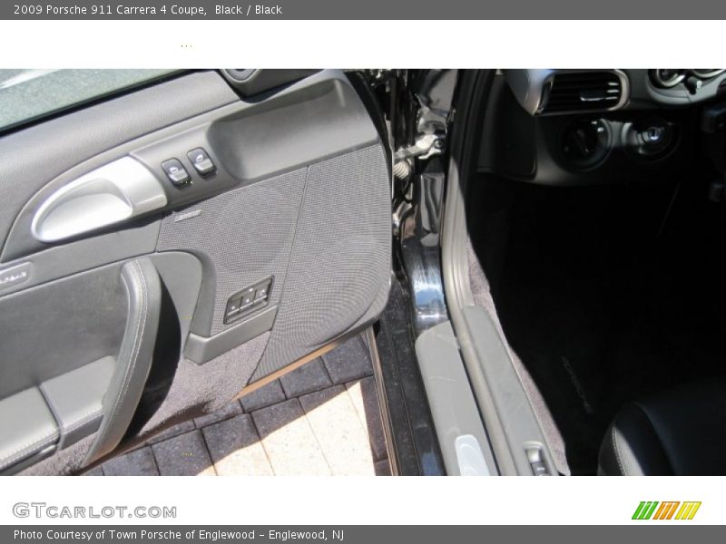 Black / Black 2009 Porsche 911 Carrera 4 Coupe