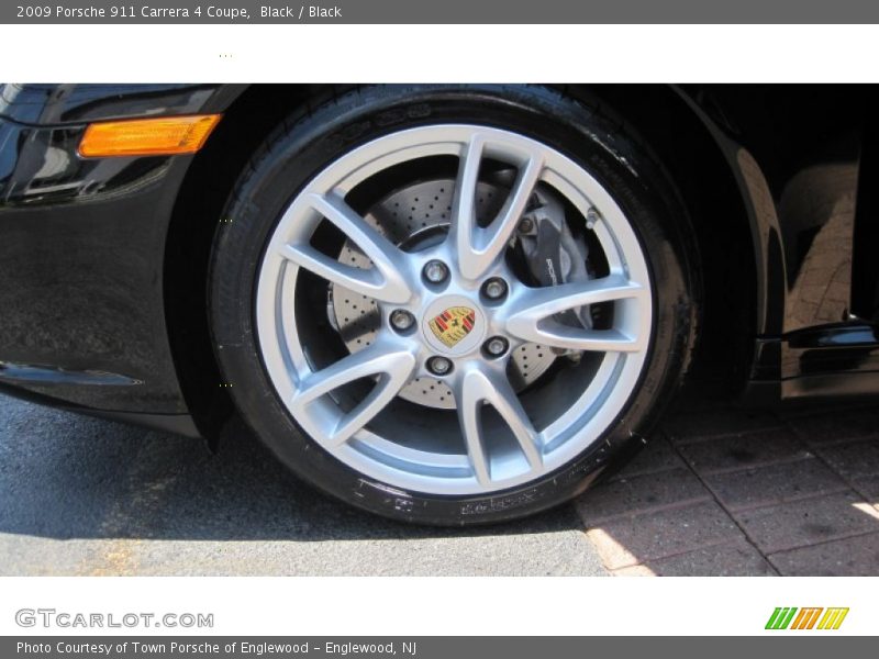 Black / Black 2009 Porsche 911 Carrera 4 Coupe