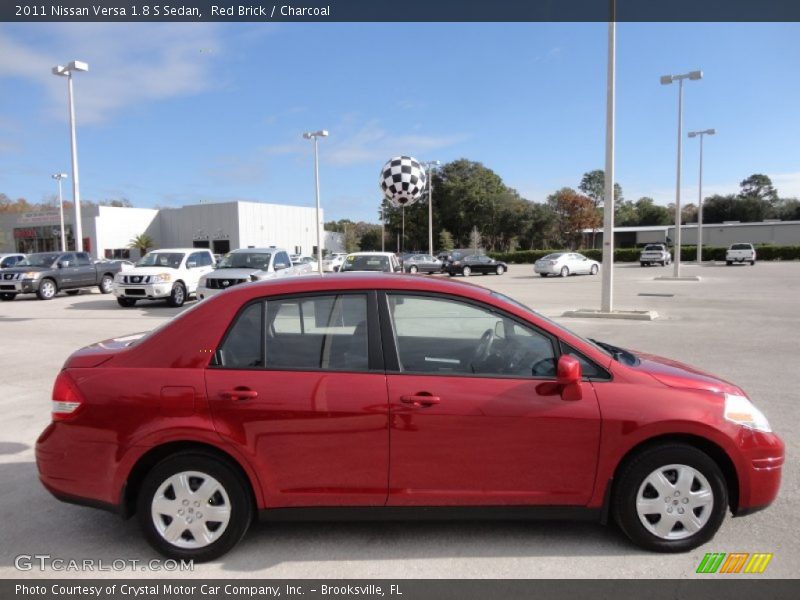 Red Brick / Charcoal 2011 Nissan Versa 1.8 S Sedan