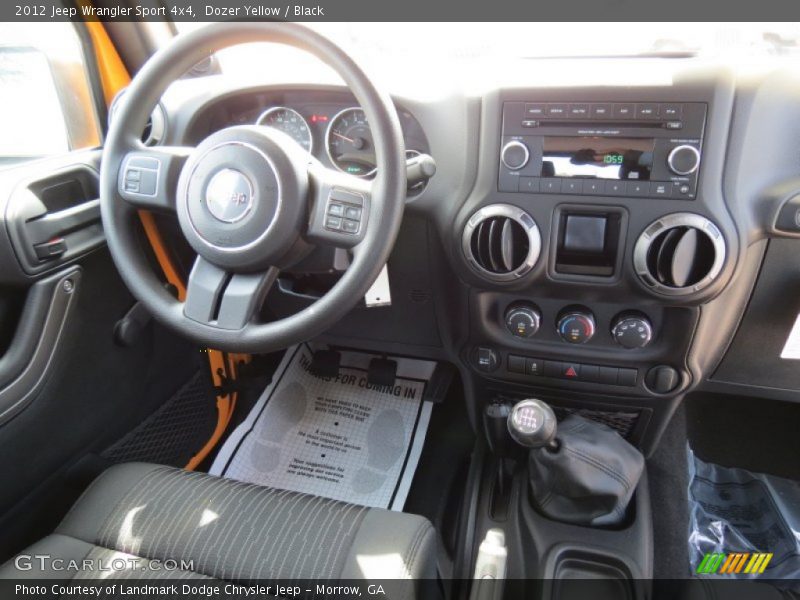 Dozer Yellow / Black 2012 Jeep Wrangler Sport 4x4