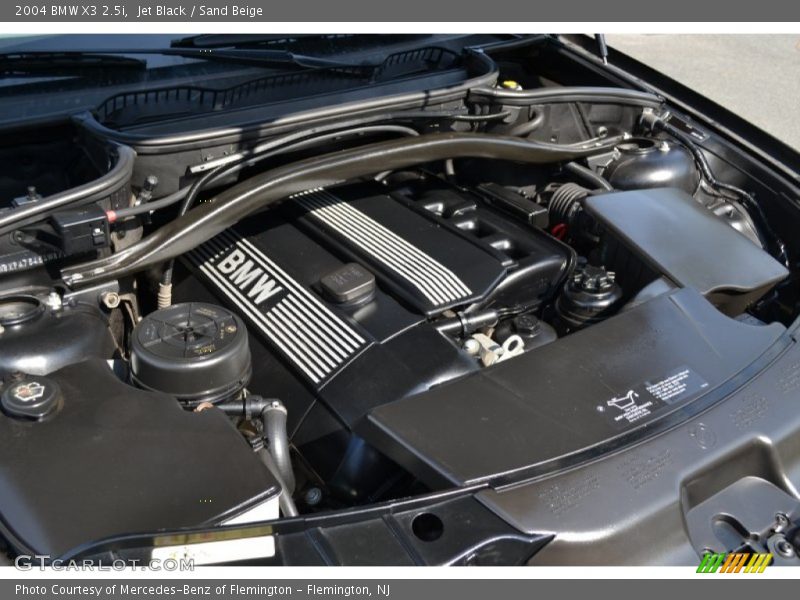 Jet Black / Sand Beige 2004 BMW X3 2.5i