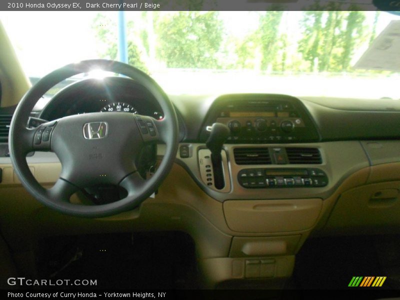Dark Cherry Pearl / Beige 2010 Honda Odyssey EX