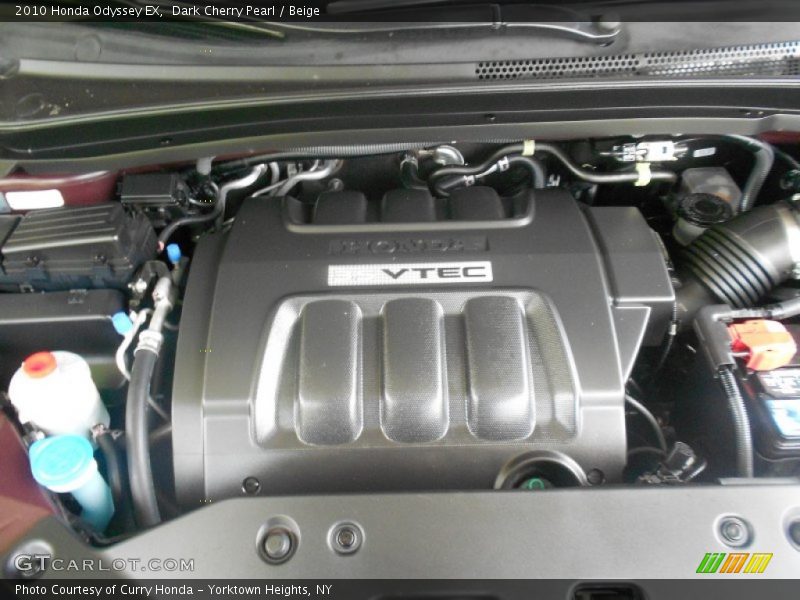 Dark Cherry Pearl / Beige 2010 Honda Odyssey EX
