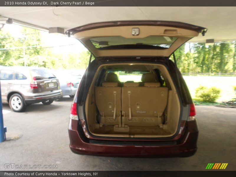 Dark Cherry Pearl / Beige 2010 Honda Odyssey EX