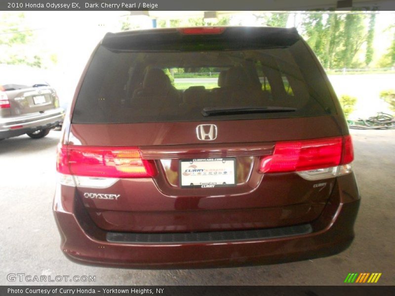 Dark Cherry Pearl / Beige 2010 Honda Odyssey EX