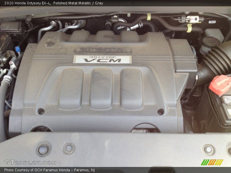Polished Metal Metallic / Gray 2010 Honda Odyssey EX-L