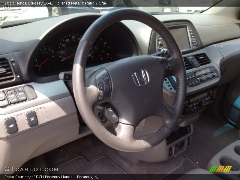 Polished Metal Metallic / Gray 2010 Honda Odyssey EX-L