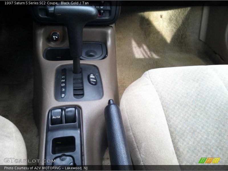 Black Gold / Tan 1997 Saturn S Series SC2 Coupe