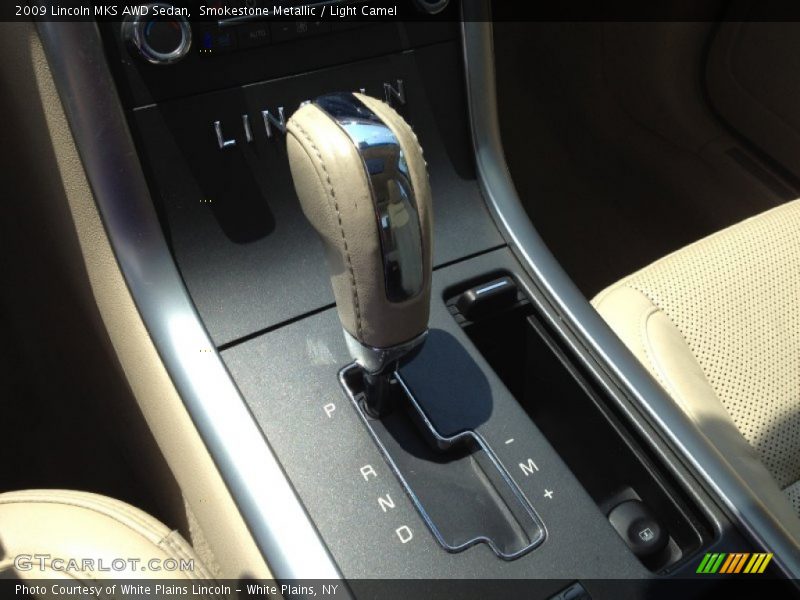 Smokestone Metallic / Light Camel 2009 Lincoln MKS AWD Sedan