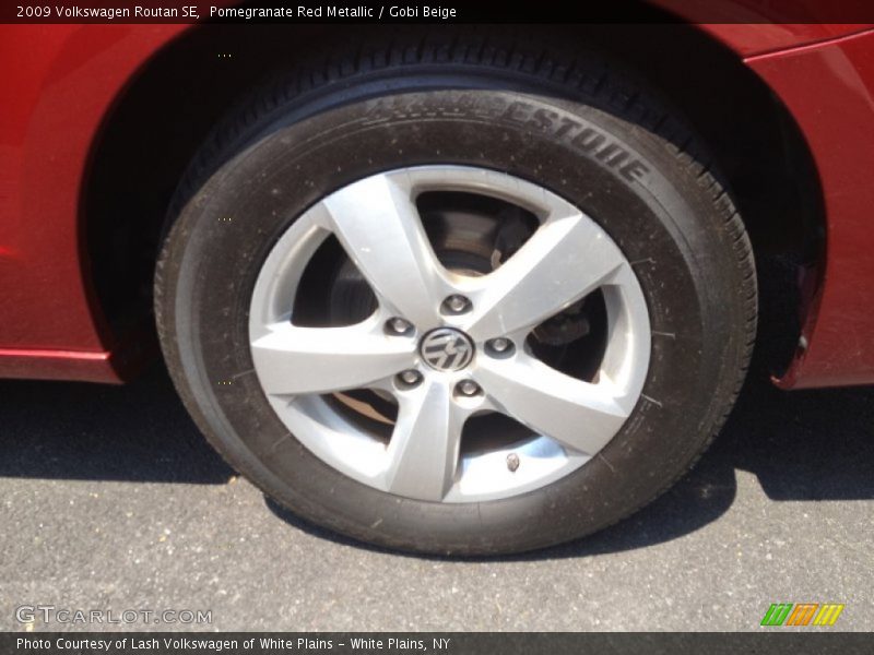 Pomegranate Red Metallic / Gobi Beige 2009 Volkswagen Routan SE