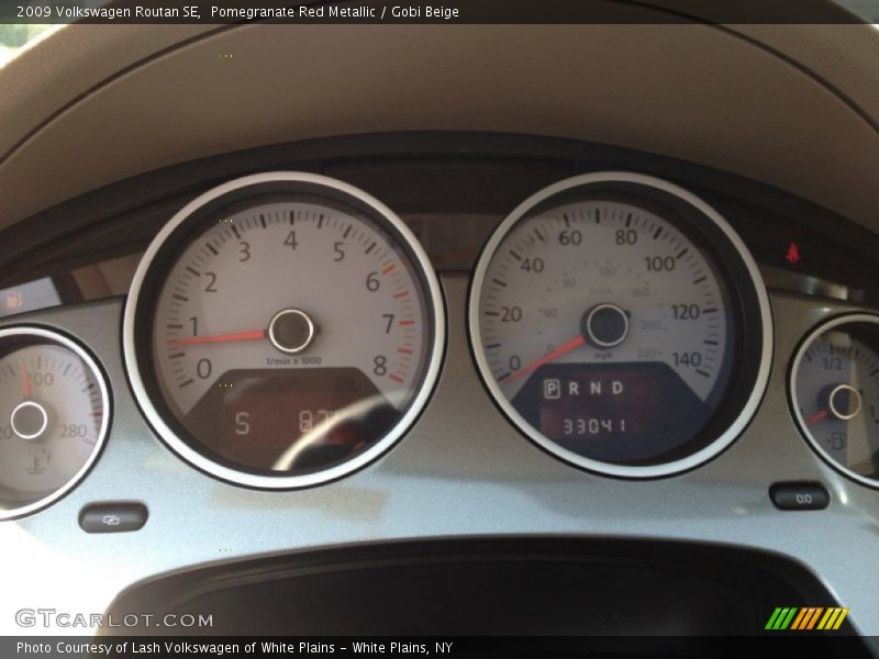 Pomegranate Red Metallic / Gobi Beige 2009 Volkswagen Routan SE