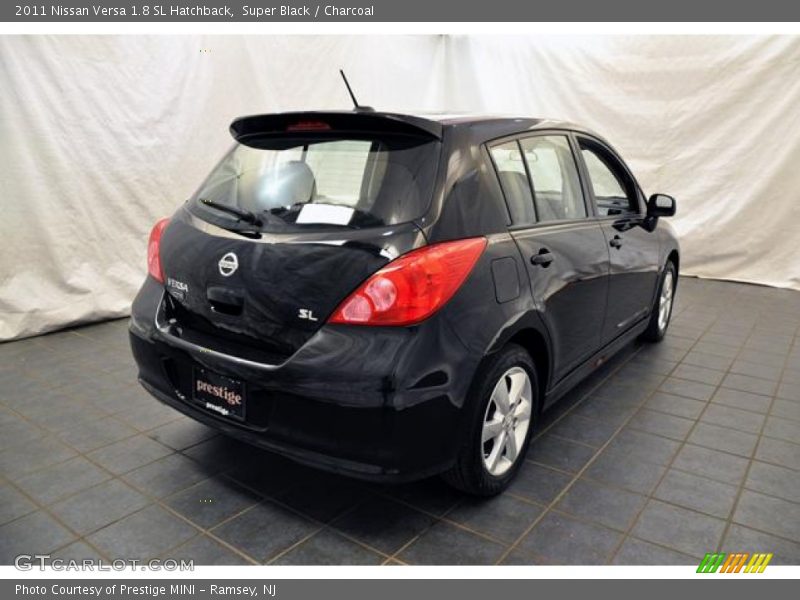 Super Black / Charcoal 2011 Nissan Versa 1.8 SL Hatchback