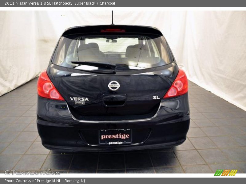Super Black / Charcoal 2011 Nissan Versa 1.8 SL Hatchback