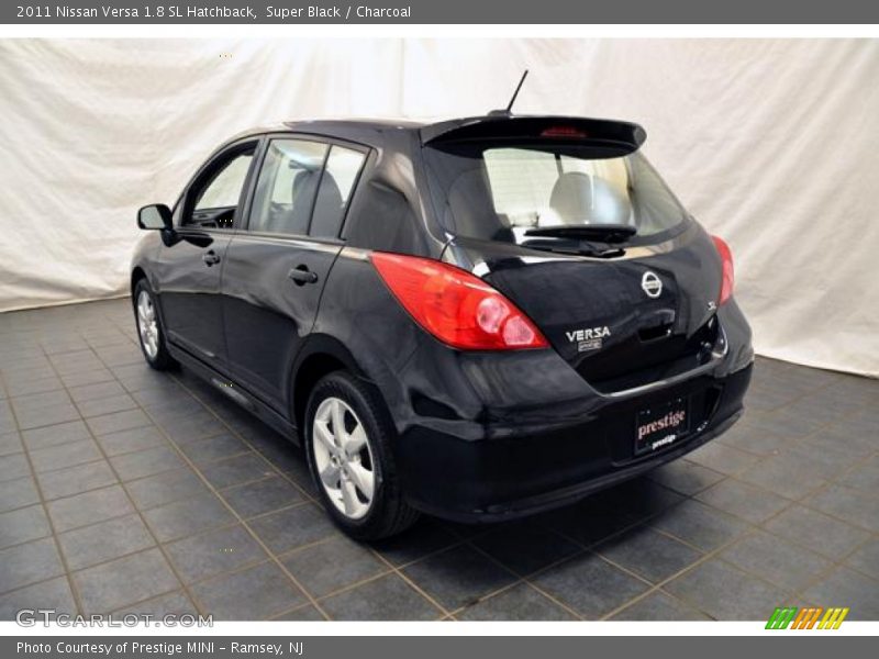 Super Black / Charcoal 2011 Nissan Versa 1.8 SL Hatchback