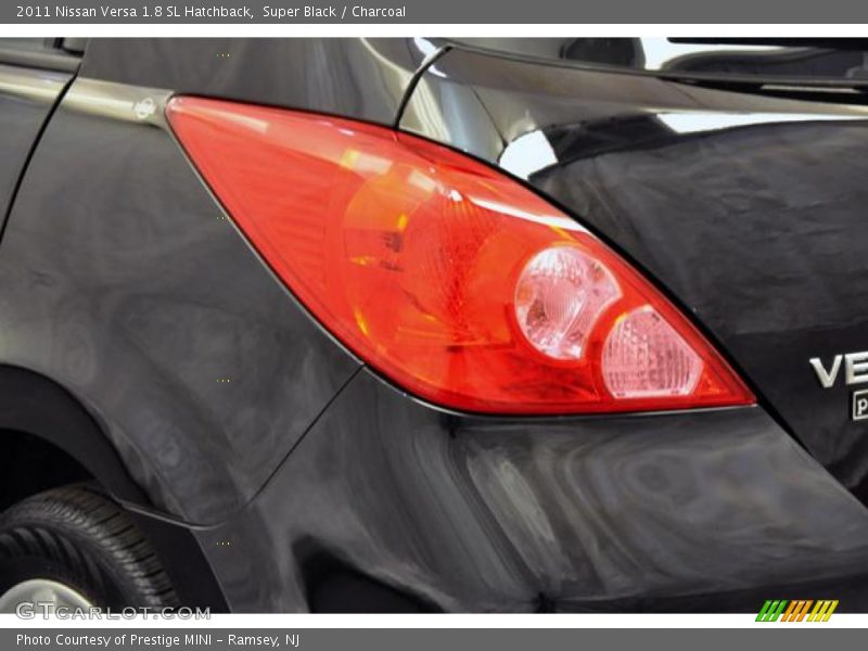 Super Black / Charcoal 2011 Nissan Versa 1.8 SL Hatchback