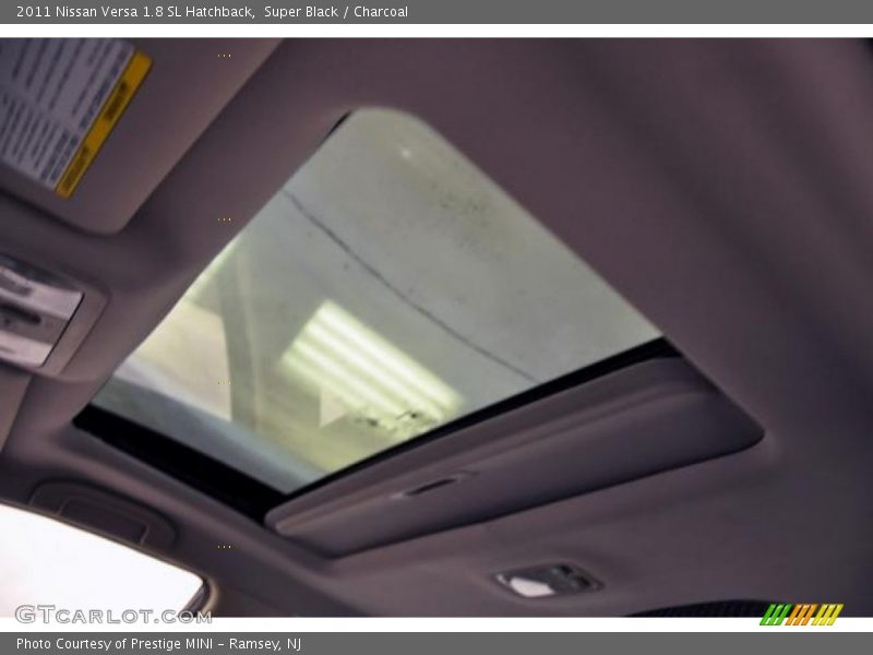 Super Black / Charcoal 2011 Nissan Versa 1.8 SL Hatchback