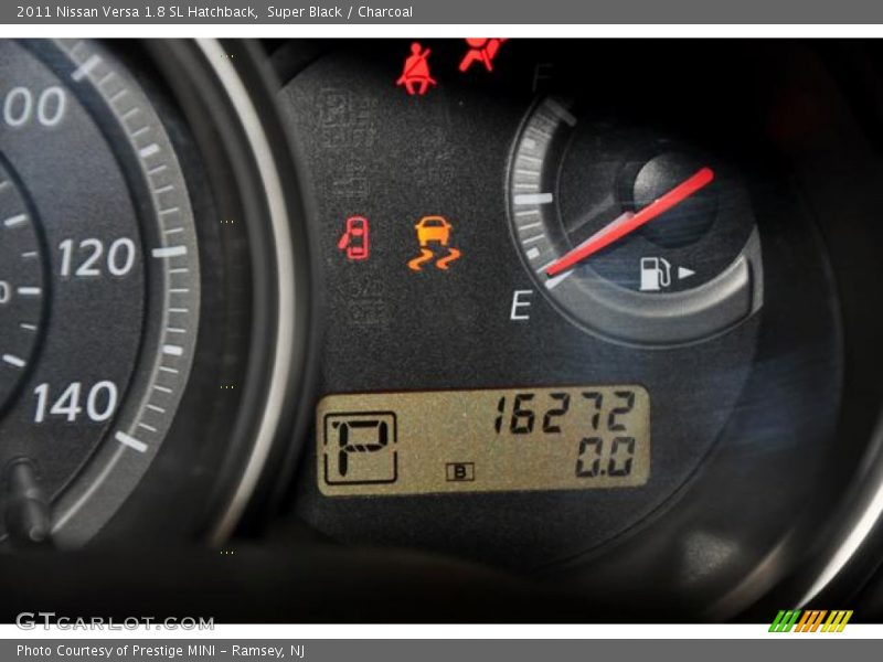 Super Black / Charcoal 2011 Nissan Versa 1.8 SL Hatchback