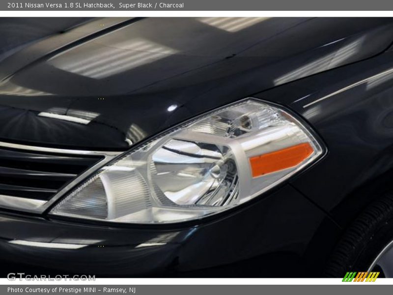 Super Black / Charcoal 2011 Nissan Versa 1.8 SL Hatchback