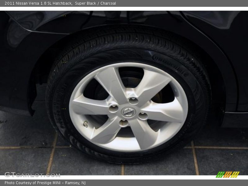 Super Black / Charcoal 2011 Nissan Versa 1.8 SL Hatchback