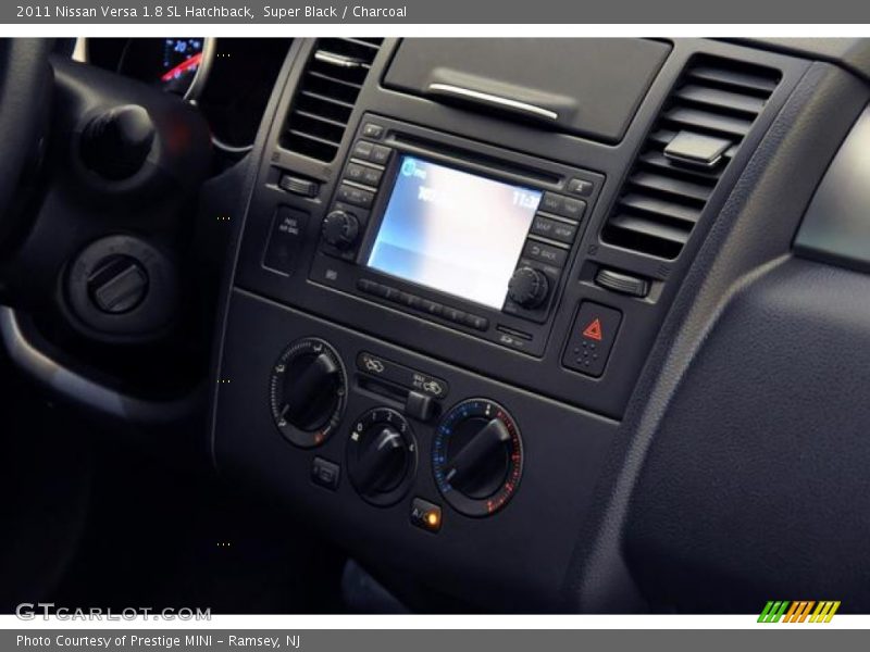 Super Black / Charcoal 2011 Nissan Versa 1.8 SL Hatchback