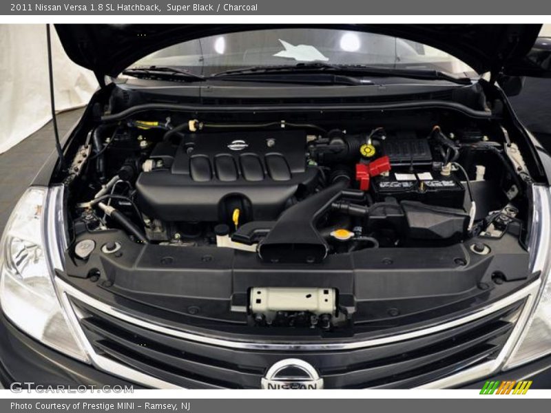Super Black / Charcoal 2011 Nissan Versa 1.8 SL Hatchback