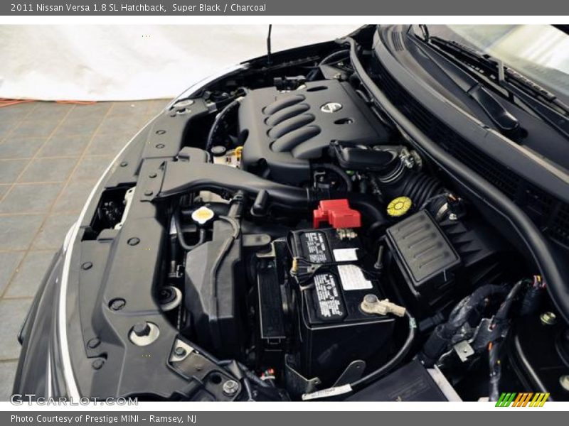 Super Black / Charcoal 2011 Nissan Versa 1.8 SL Hatchback