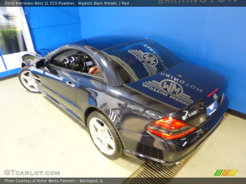 Majestic Black Metallic / Red 2009 Mercedes-Benz SL 550 Roadster