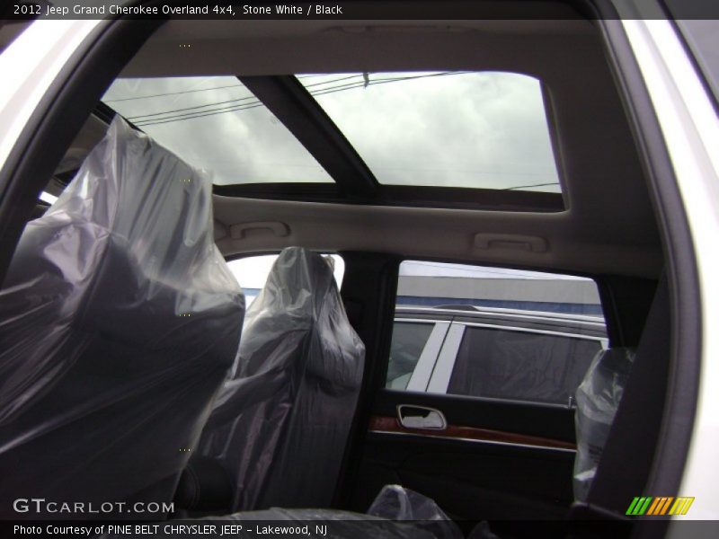 Stone White / Black 2012 Jeep Grand Cherokee Overland 4x4