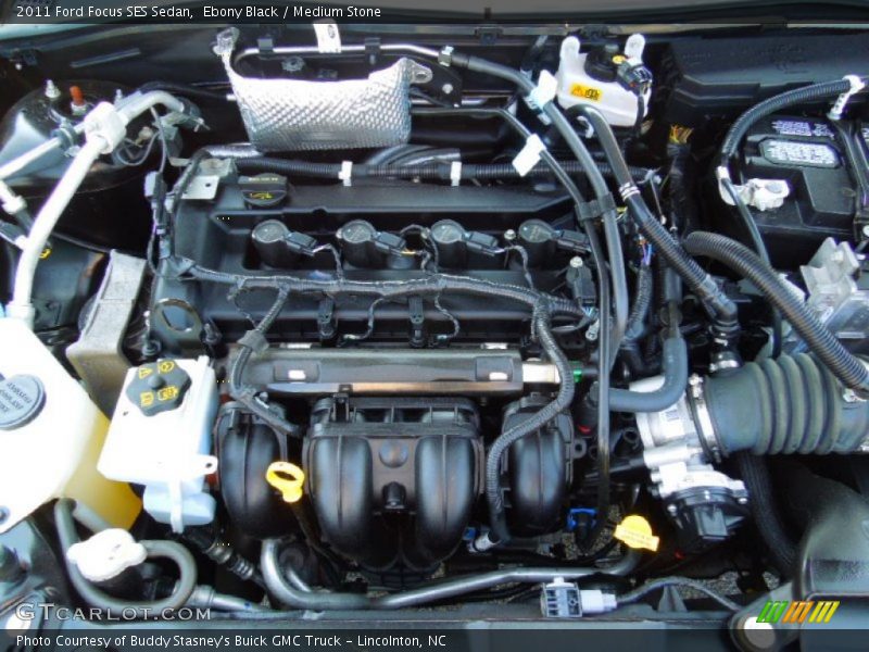 Ebony Black / Medium Stone 2011 Ford Focus SES Sedan