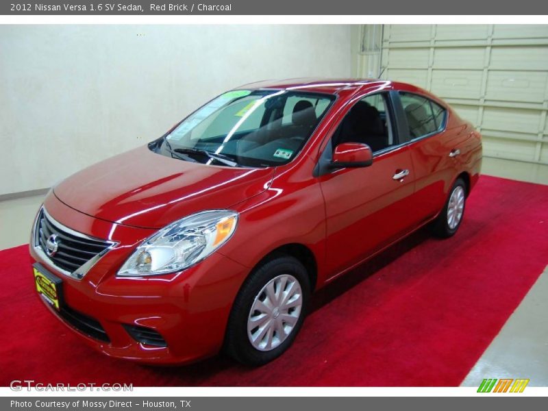 Red Brick / Charcoal 2012 Nissan Versa 1.6 SV Sedan