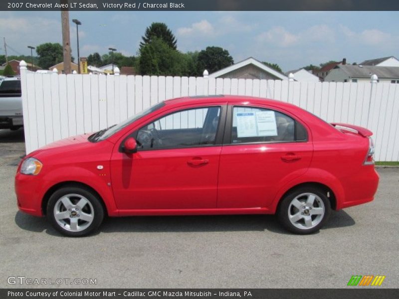 Victory Red / Charcoal Black 2007 Chevrolet Aveo LT Sedan