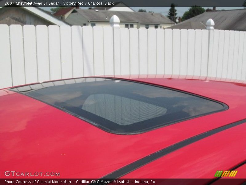 Victory Red / Charcoal Black 2007 Chevrolet Aveo LT Sedan